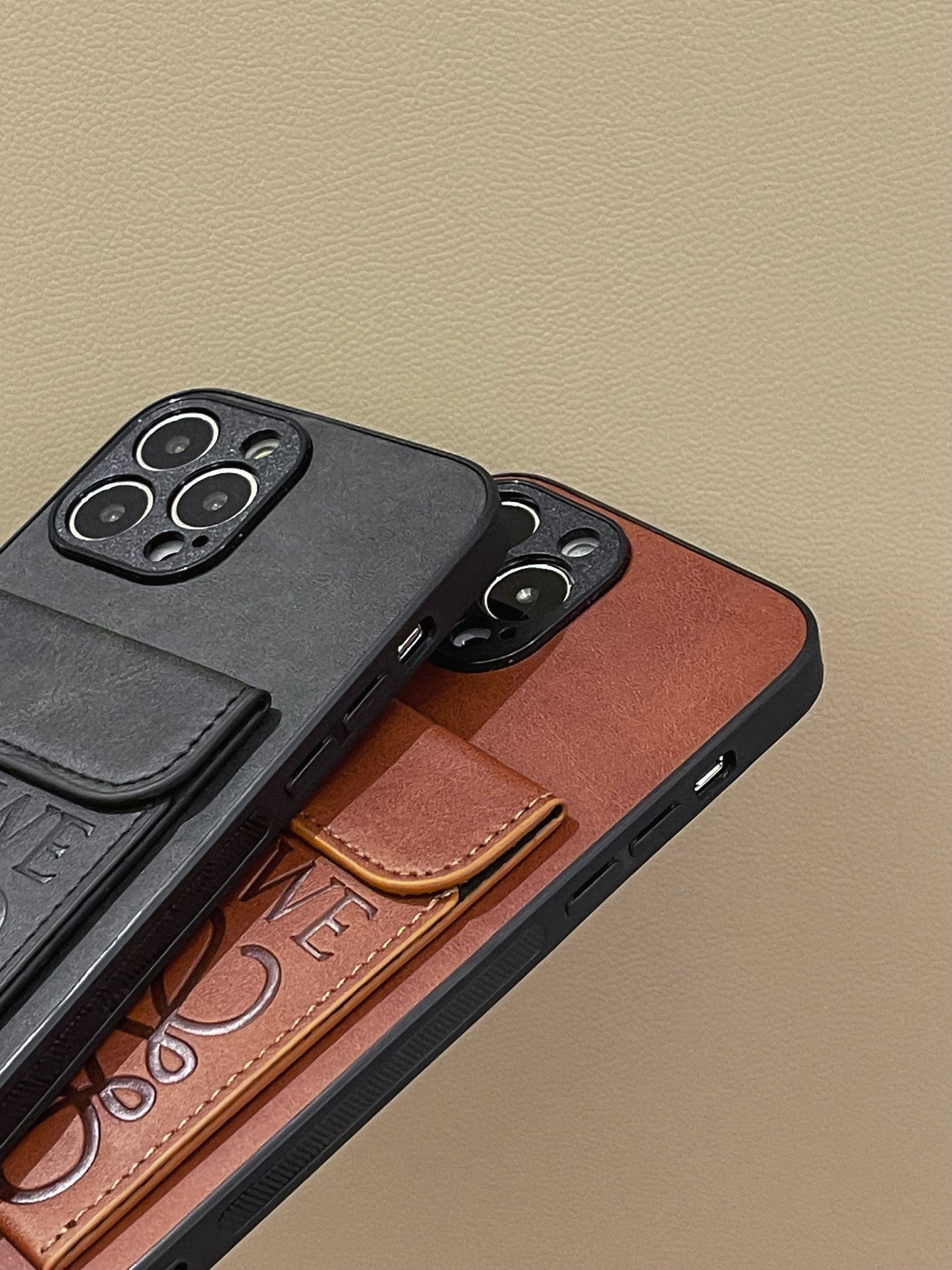 Loewe iPhone -kotelo kortinpidikkeellä Black-LZP241448